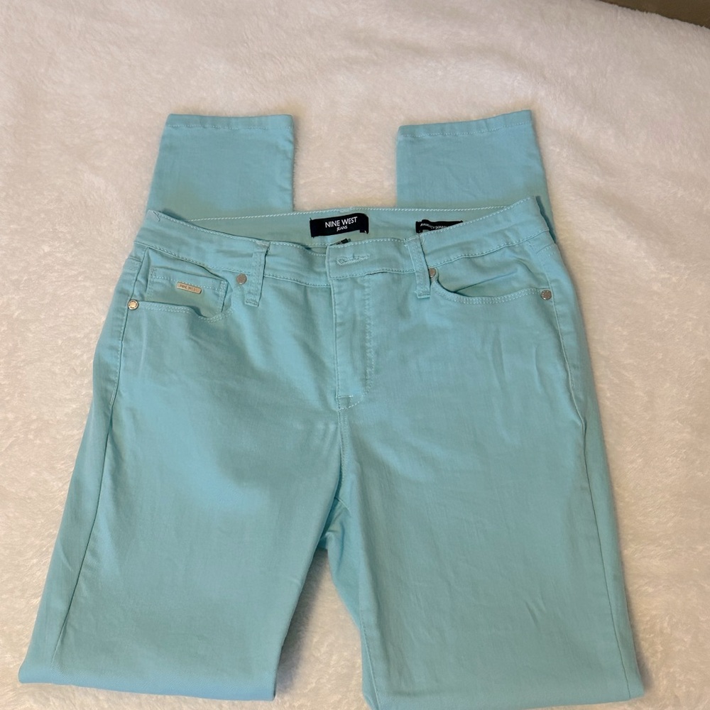 Mint colored skinny jeans